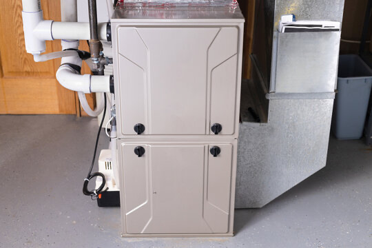 A professionally installed high-efficiency gas furnace in a Colorado home